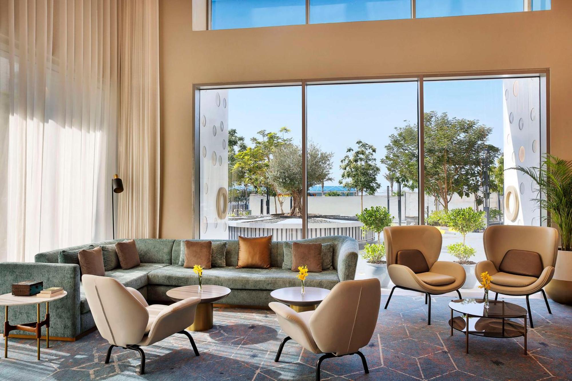 Tumbi West Palm Beach Hotel Dubai,Tapestry Collection Hilton Exterior photo